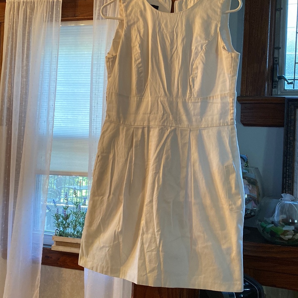 BCX White Dress Juniors Size 11/Women Small 16”W x 33”L pockets/back zipper.